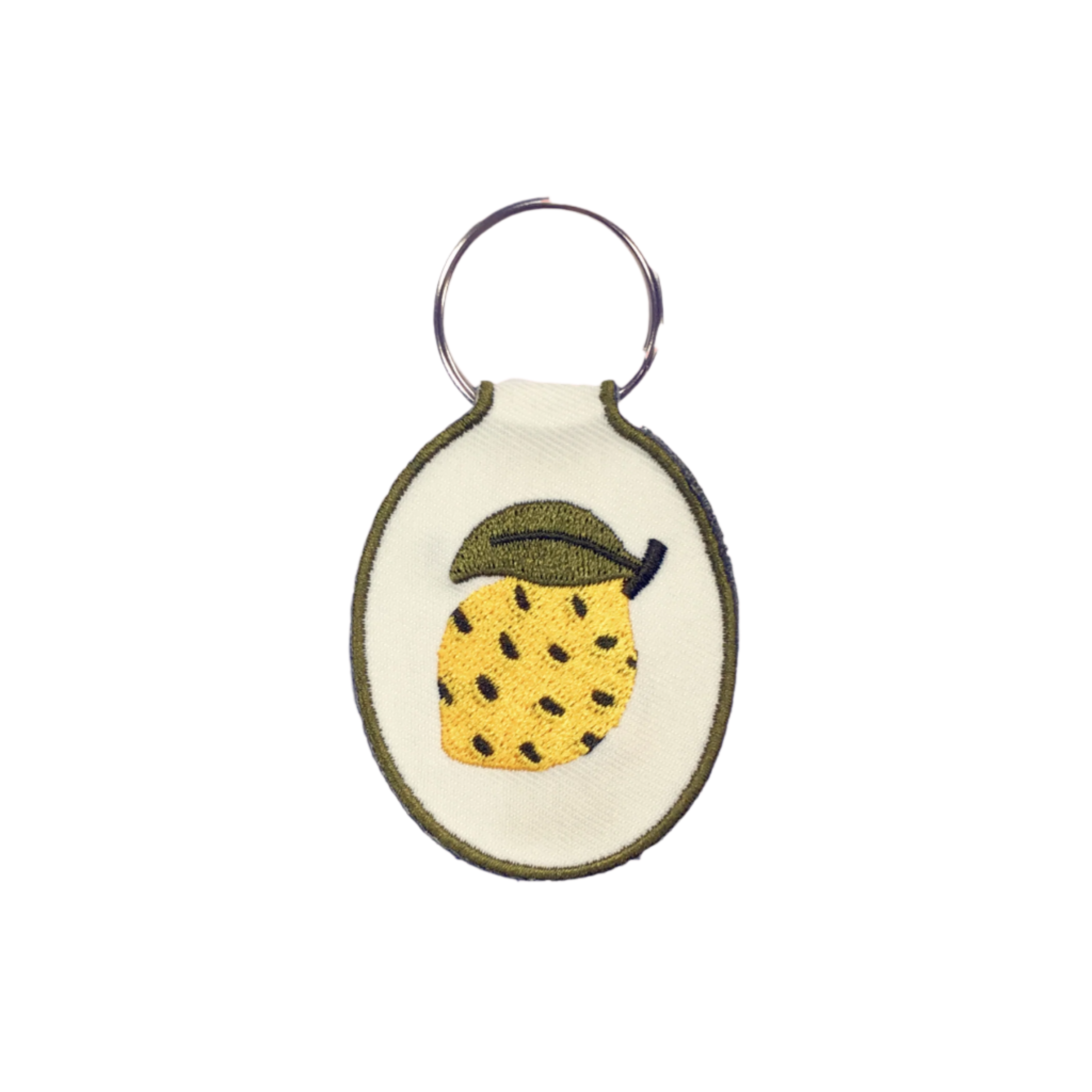 Lemon embroidered keychain on cream cotton twill gift shop